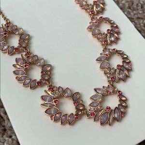 Adjustable pink jeweled necklace